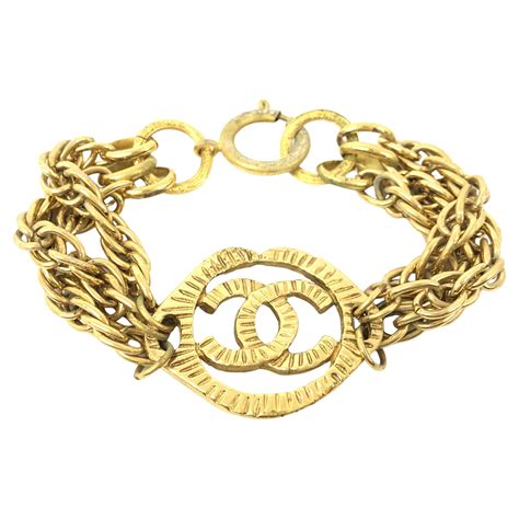 vintage chanel gold chain bracelet with cc charm